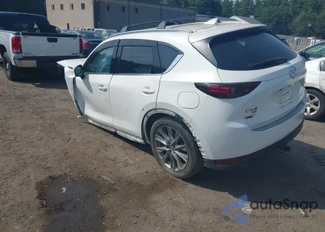 2021 Mazda Cx-5 Grand Touring z USA, uszkodzony, nr VIN JM3KFBDM5M0317866